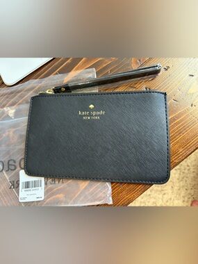 kate spade Black Leather Wristlet with Gold Hardware and Tan Polka Dot Lining
